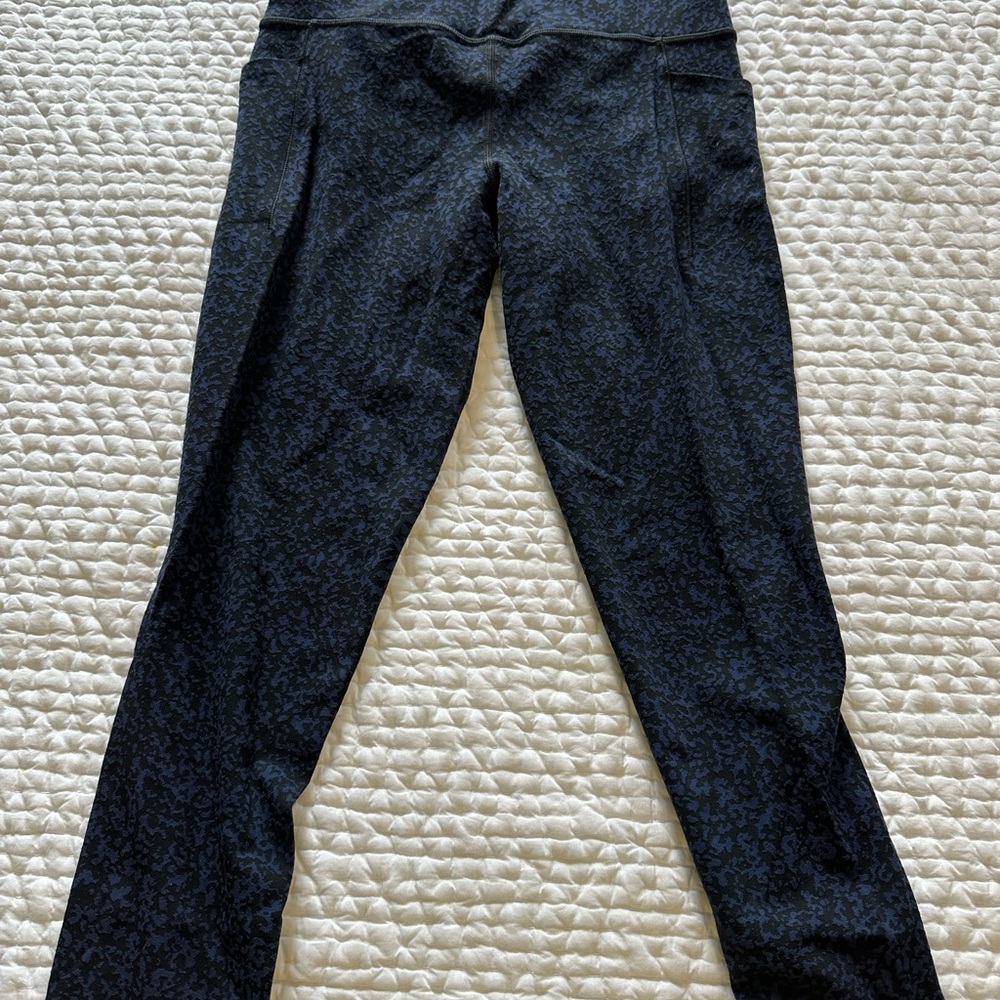 Athleta Salutation Stash Pocket Gravel Tight Size Small  Blue and Black color